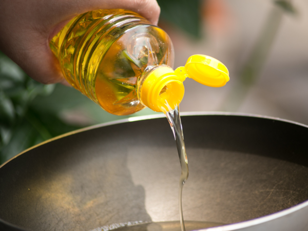 Bottle of vegetable oil with potential health risks